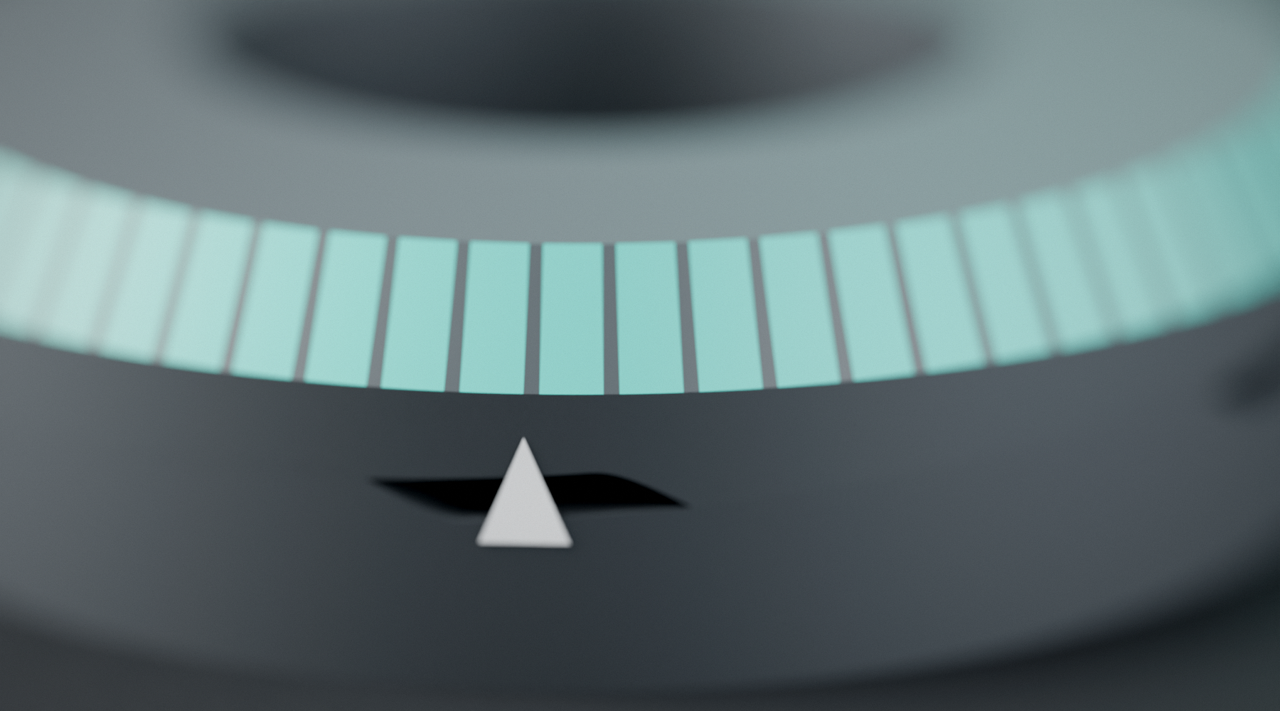 Macro of the ISOKLAMP clamp-force reserve indicator, showing the etched vernier scale over the green zone with the index arrow