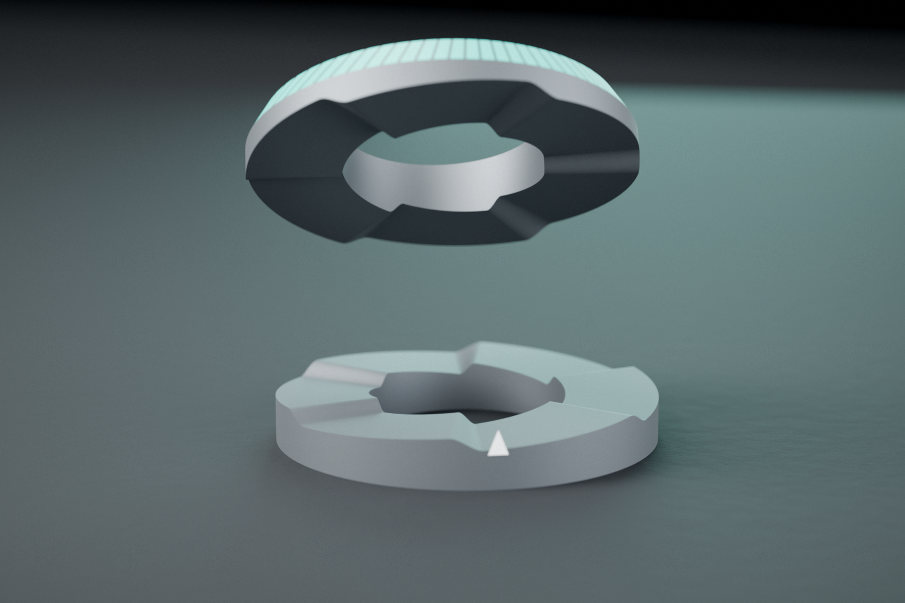 The two ISOKLAMP rings separated in mid-air, showing the smooth multi-start helical ramp faces that mate together